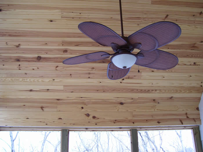 <p>Vaulted ceiling on screen porch with pine bead board</p>