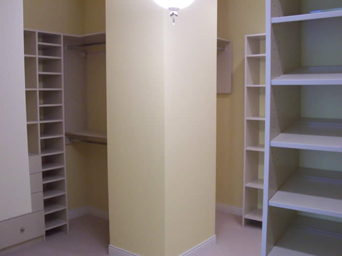 <p>Organized custom closet shelving</p>