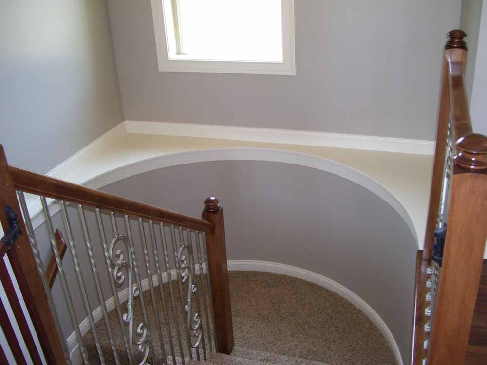 Arched landing on staircase