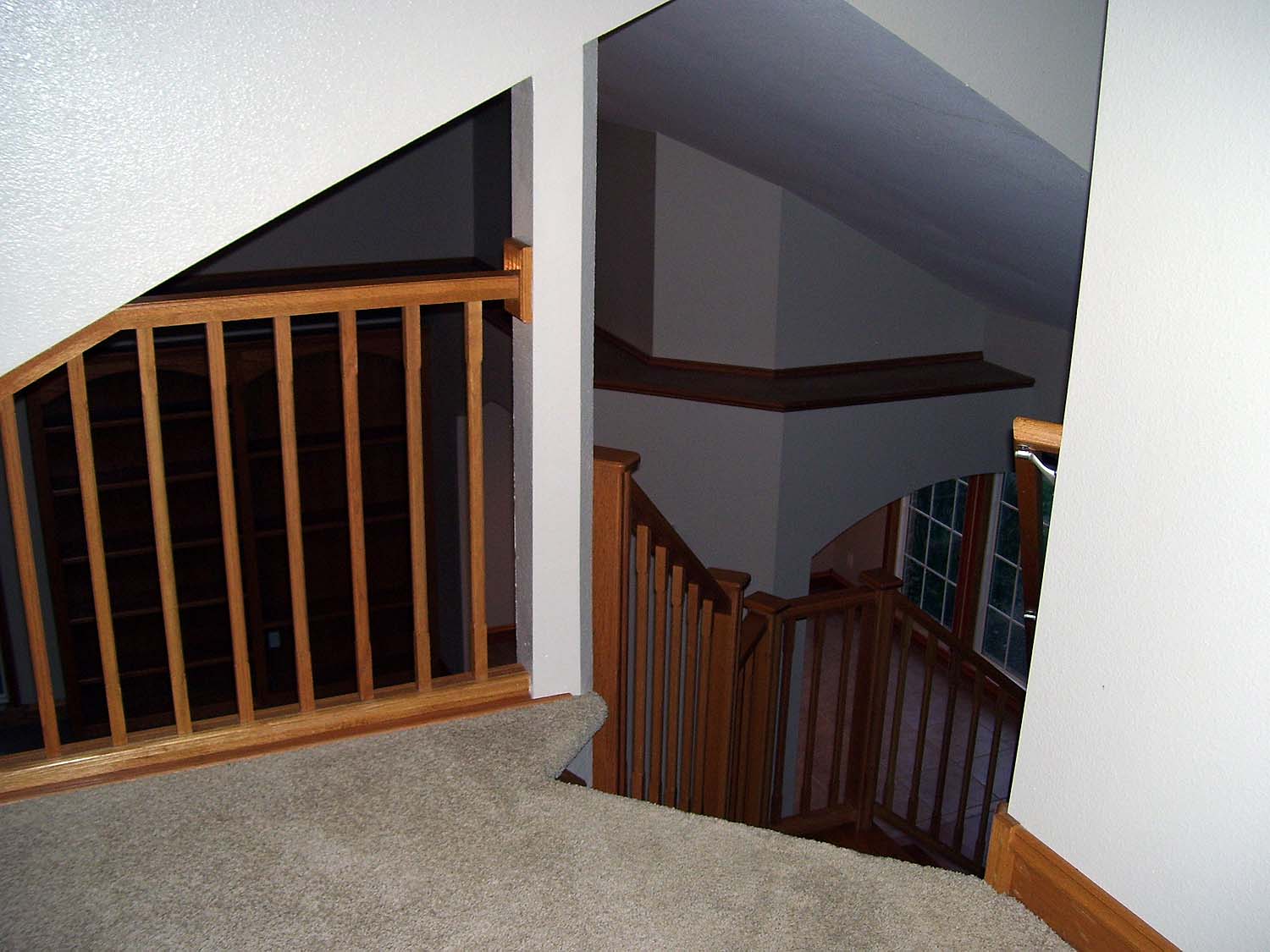 Upper loft family room looking down into great room