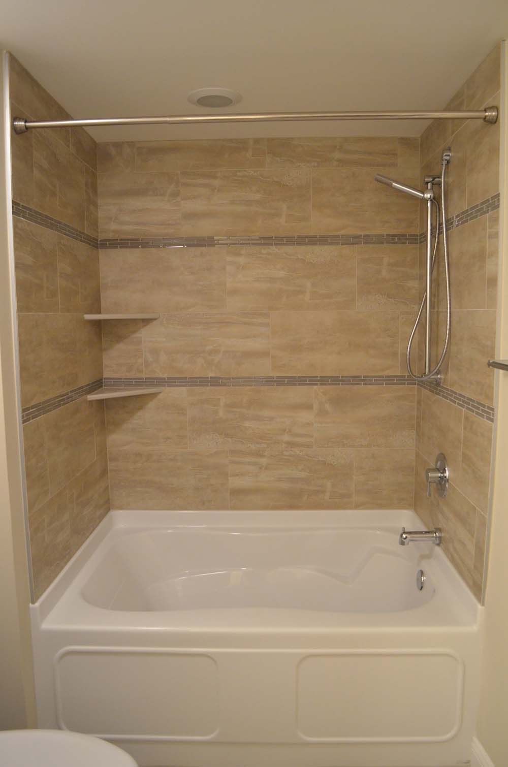 <p>42" x 60" Tub with tile walls</p>
