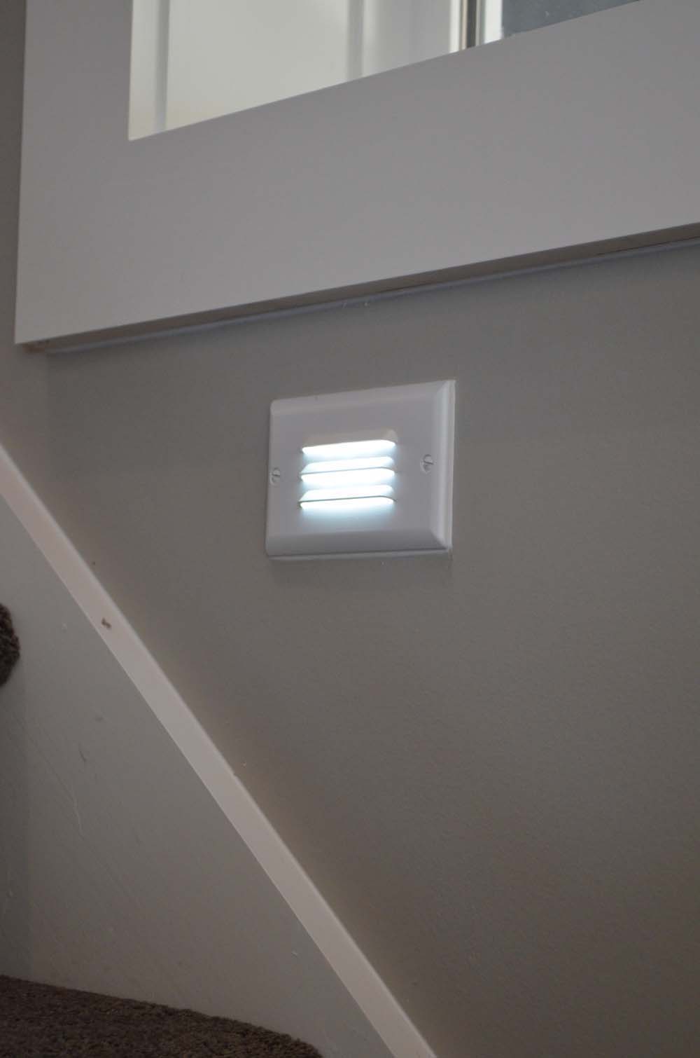 <p>recessed step light in wall</p>