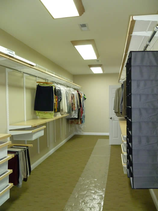 <p>Organized custom closet shelving</p>