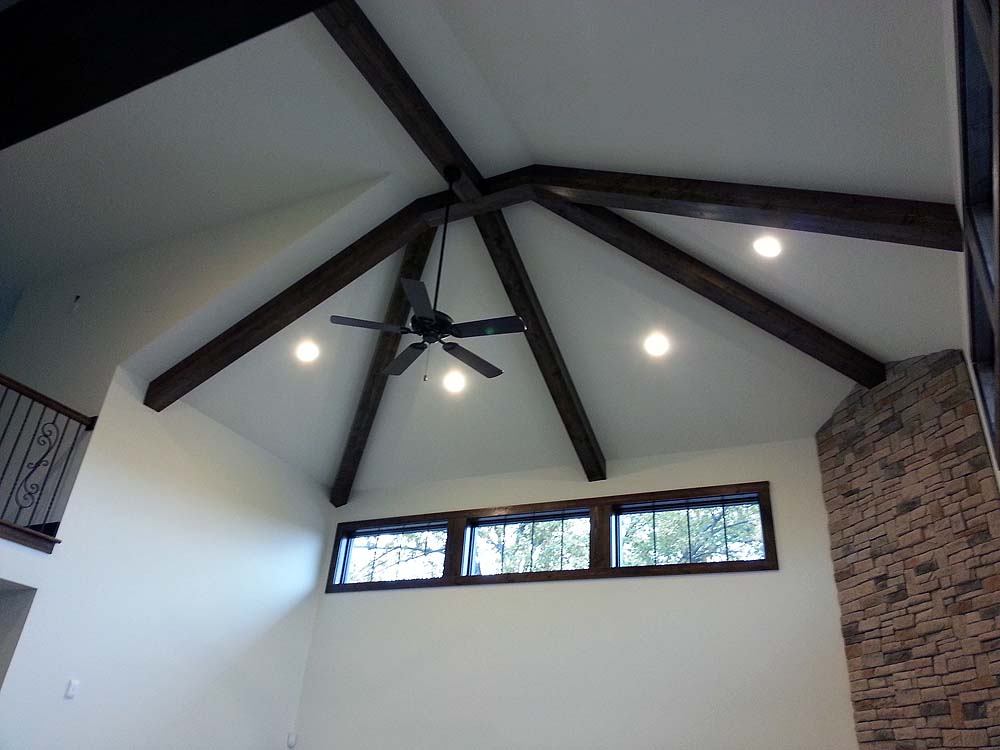 <p>Boxed pine beams on great room ceiling</p>