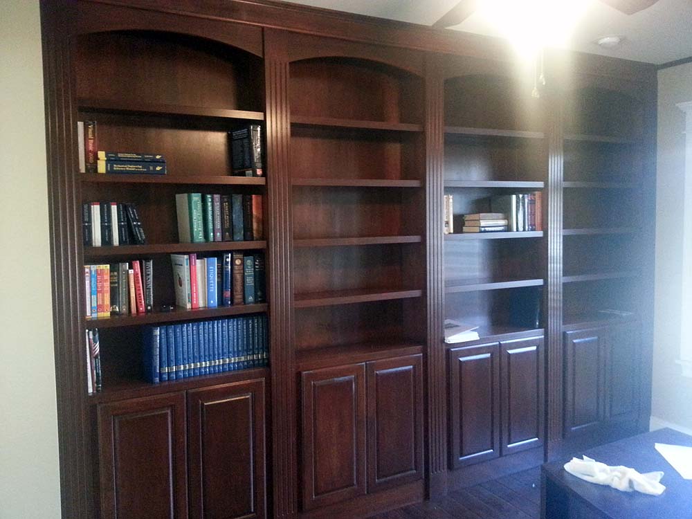 <p>Dark stained wall unit</p>