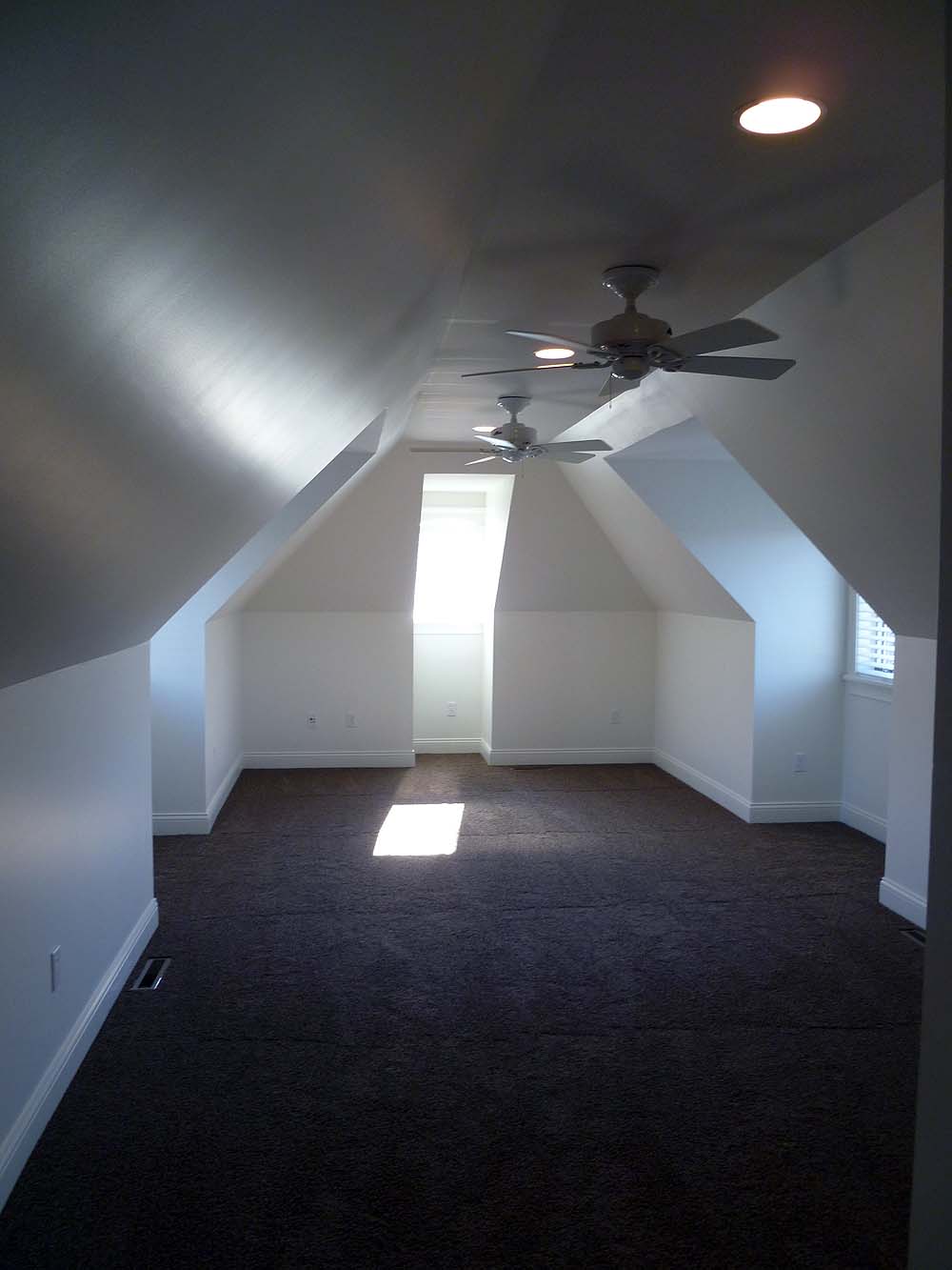 <p>Inside view of dormers in attic bonus room over garage.</p>