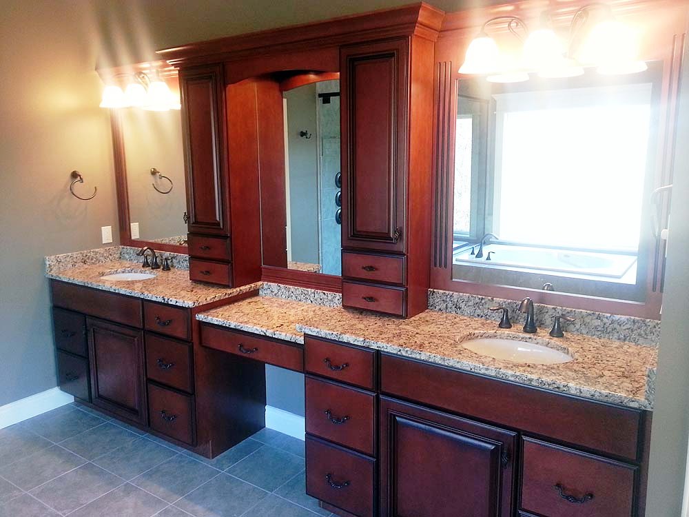 <p>Long vanity with upper cabinets</p>