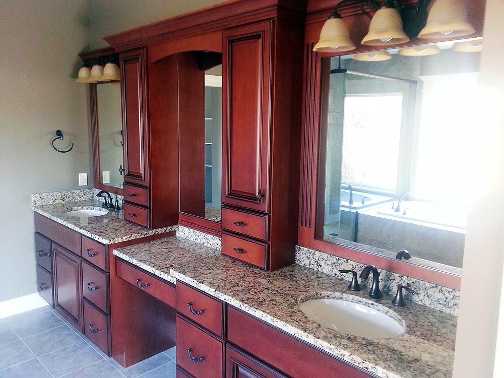 <p>Long vanity with upper cabinets</p>