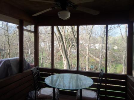 Screened in porch off eating area