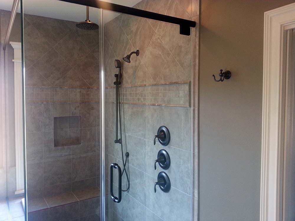 <p>Shower with glass walls</p>