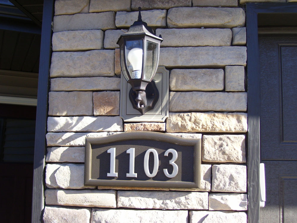 Soft Curve house number plaque.