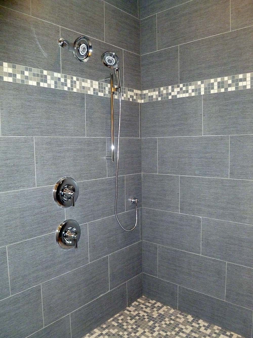 <p>Tile walled master shower</p>