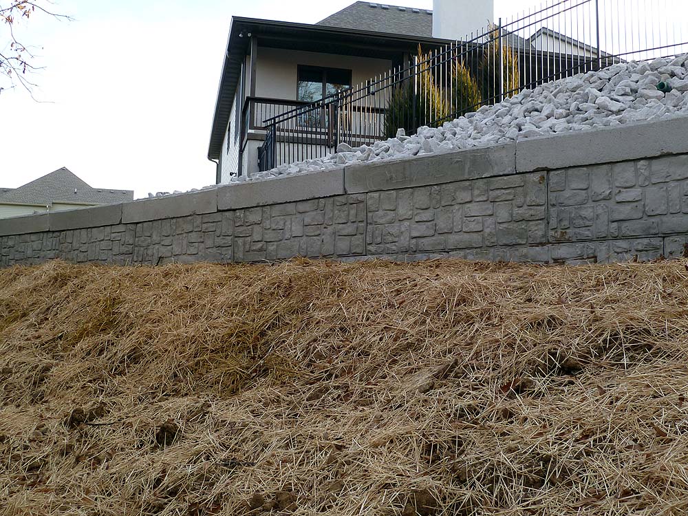 Solid large concrete block retaining wall