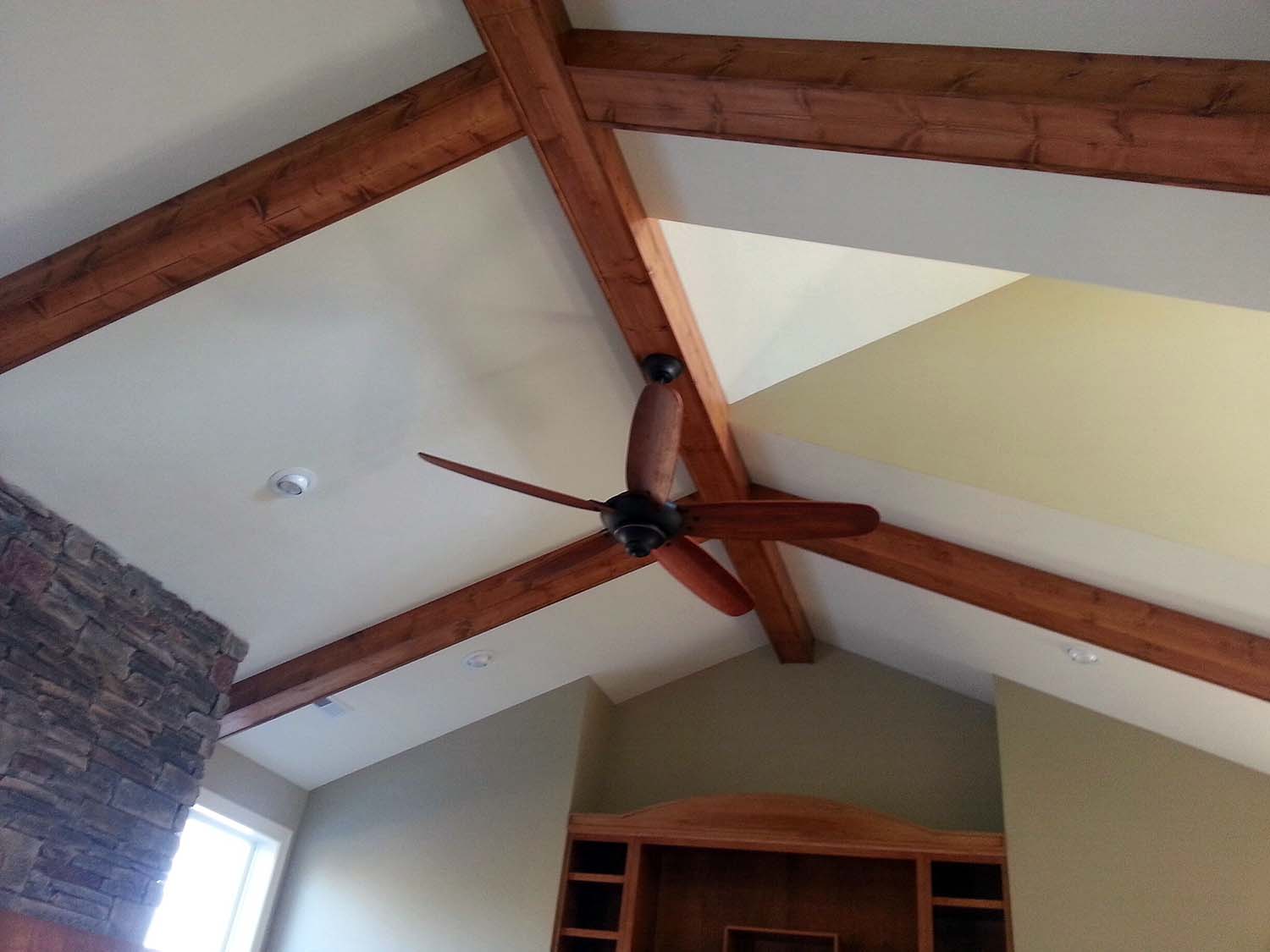 Vaulted ceiling with stained beams