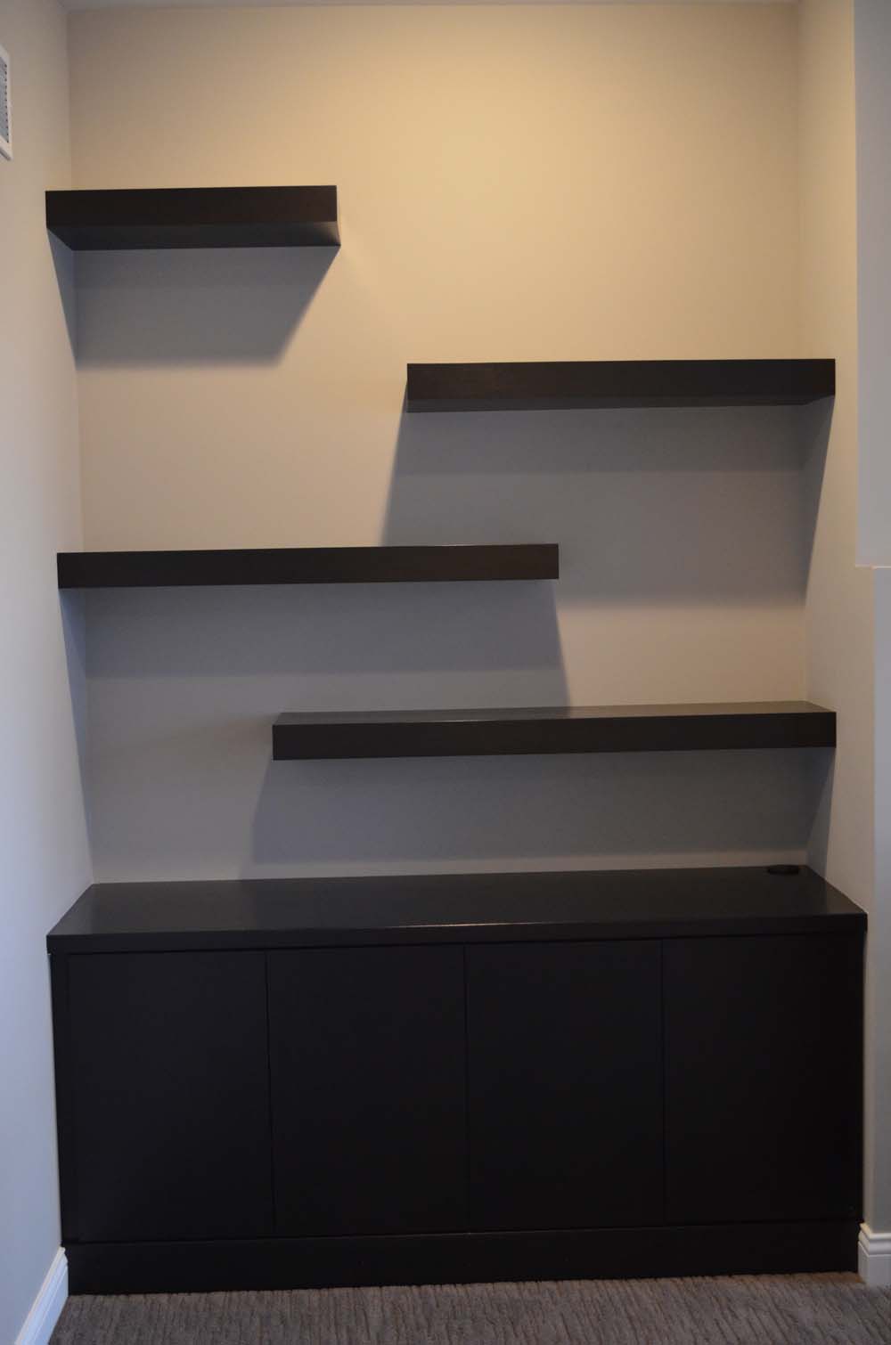 <p>Built in with floating shelves.  Contemporary style</p>