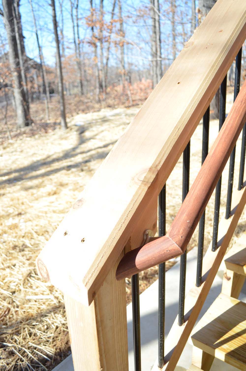 <p>Grippable handrail below 2x6 top rail on deck stairs.</p>