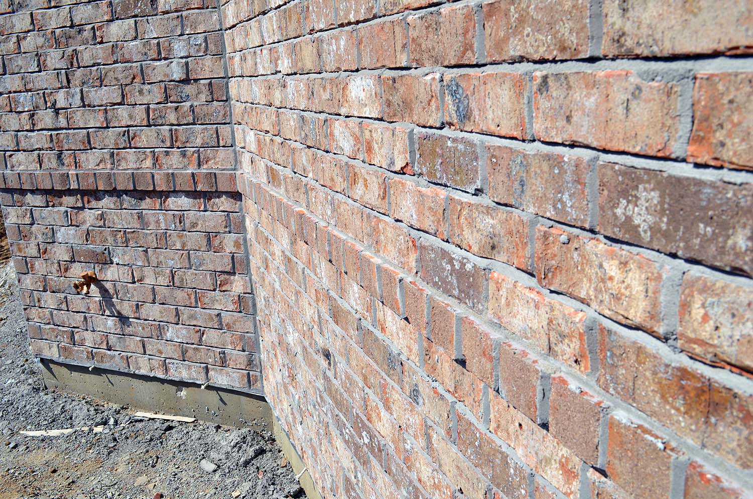 <p>Brick wall with projecting row lock</p>