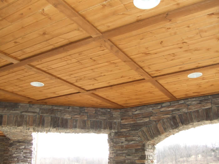 <p>Wood porch ceiling with grid</p>