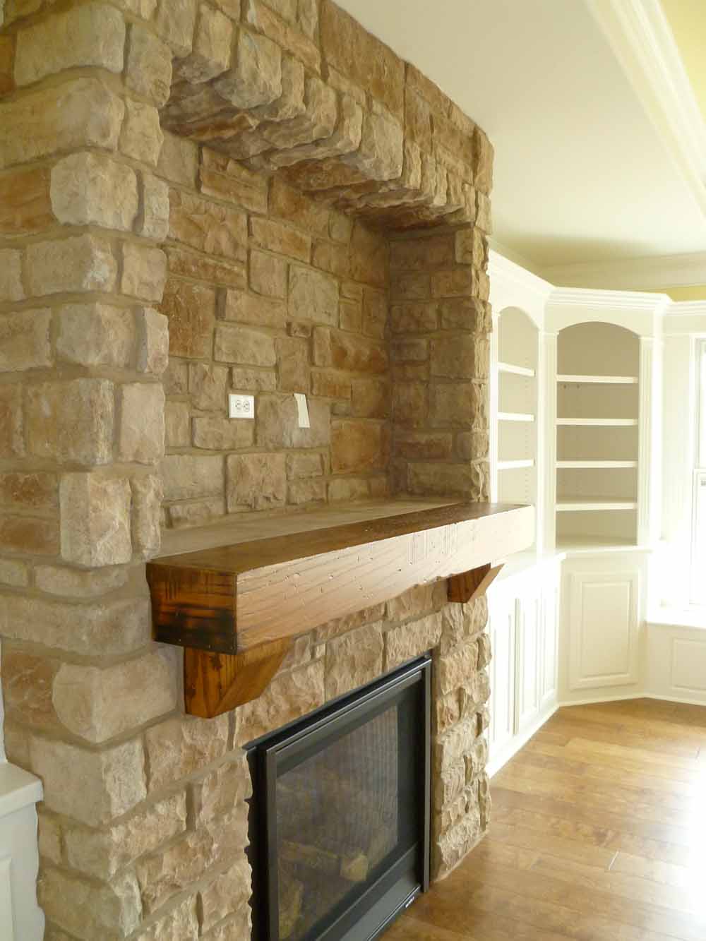 <p>Indent in stone over mantle for TV</p>