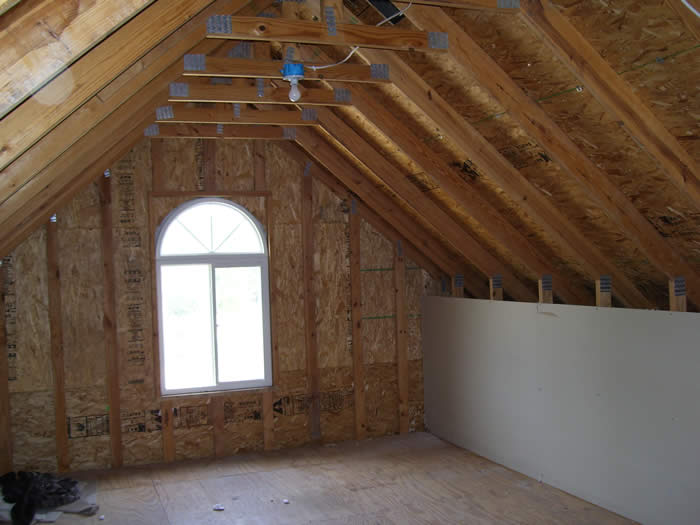 Unfinished attic bonus room over garage