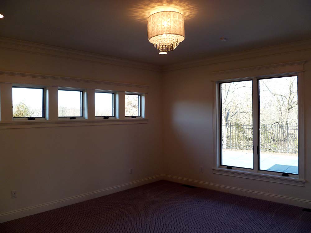 <p>small square windows in master bedroom</p>